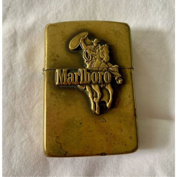 zippo Other - Vintage RARE 1986 Marlboro Man Cowboy Rider Lasso Brass Zippo Lighter USA